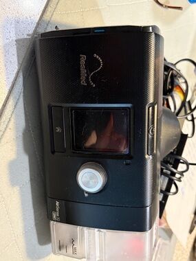 ResMed Black CPAP Machine with Clear Humidifier Chamber and Silver Dial